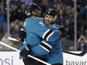 San Jose Sharks' Joe Pavelski, right, celebrates his goal with teammate Evander Kane during the second period of an NHL hockey game against the Edmonton Oilers on Tuesday, Feb. 27, 2018, in San Jose, Calif.