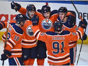 Edmonton Oilers forward Drake Caggiula (91) celebrates with teammates after scoring on the Tampa Bay Lightning at Rogers Place in Edmonton on Monday, Feb. 5, 2018. (Ed Kaiser)