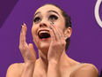 Canada's Kaetlyn Osmond reacts after her free skate.
