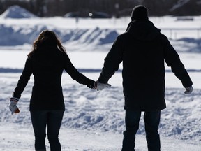 A couple skates at Hawrelak Park on Valentine's Day in Edmonton on Saturday, Feb. 14, 2014.