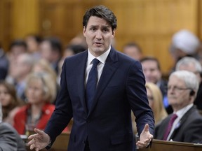 Prime Minister Justin Trudeau rises during Question Period in the House of Commons on Parliament Hill in Ottawa on Monday, Feb. 12, 2018.