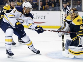 Boston Bruins' Tuukka Rask (40), of Finland, blocks a shot by Buffalo Sabres' Evander Kane (9) during the third period of an NHL hockey game in Boston, Saturday, Feb. 10, 2018. The Sabres won 4-2.