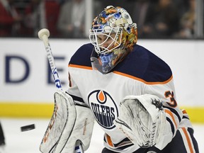 Edmonton Oilers goaltender Cam Talbot makes a glove save during the second period of the team's NHL hockey game against the Los Angeles Kings, Saturday, Feb. 24, 2018, in Los Angeles.
