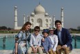 Prime Minister of Canada Justin Trudeau, his wife Sophie Gregoire and his children pose for a photograph during their visit to Taj Mahal in Agra on February 18, 2018. Trudeau and his family arrived at the Taj Mahal on February 18, kickstarting their week-long trip to India aimed at boosting economic ties between the two countries. / AFP PHOTO / MONEY SHARMAMONEY SHARMA/AFP/Getty Images