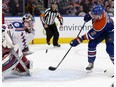 The Edmonton Oilers' Andrej Sekera scores on New York Rangers goalie Antti Raanta in this file photo from Rogers Place, in Edmonton on Nov. 13, 2016. (File)
