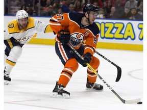 Nashville Predators' Yannick Weber (7) tries to catch Edmonton Oilers captain Connor McDavid (97) on a breakaway at Rogers Place in Edmonton on Thursday, March 1, 2018. (David Bloom)