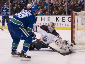 Sam Gagner #89 of the Vancouver Canucks shoots the puck over the glove of goalie Cam Talbot #33 of the Edmonton Oilers for a goal in NHL action on March, 29, 2018 at Rogers Arena in Vancouver, British Columbia, Canada.