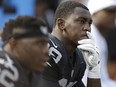 In this Sept. 13, 2015, file photo, Oakland Raiders linebacker Aldon Smith (99) sits on the bench in Oakland, Calif. (AP Photo/Ben Margot, File)