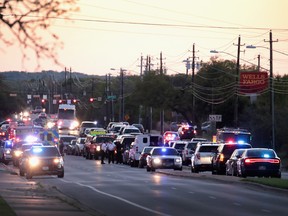 Police respond after one person was injured by a package containing an incendiary device at a nearby Goodwill store on March 20, 2018 in Austin, Texas. (Scott Olson/Getty Images)