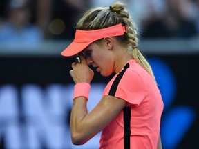 Canada's Eugenie Bouchard reacts during a women's singles match against Romania's Simona Halep at the Australian Open on Jan. 18, 2018