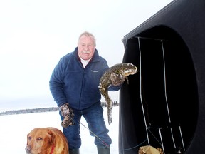 Neil and Penny with a Lac Ste. Anne burbot.