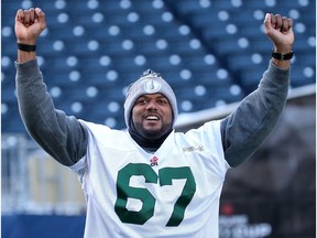 Edmonton Eskimos offensive lineman D'Anthony Batiste does a little foreshadowing for the camera during the final walkthrough in preparation for the 2015 Grey Cup in Winnipeg. The Eskimos ended up defeating the Ottawa Redblacks 26-20. (File)