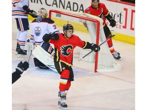 Calgary Flames Johnny Gaudreau celebrates  after scoring against the Edmonton Oilers in NHL hockey at the Scotiabank Saddledome in Calgary on Tuesday, March 13, 2018.