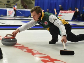 Skip Karsten Sturmay throwing his rock against Team Sluchinski during draw 2 of the 2018 Boston Pizza Cup Alberta Men's Curling Championship at Grant Fuhr Arena in Spruce Grove, January 31, 2018.