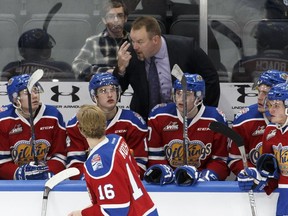 Edmonton Oil Kings head coach Steve Hamilton speaks with his players during WHL action against the Brandon Wheat Kings at Rogers Place in Edmonton on Oct. 25, 2016.