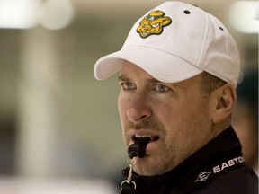 Eric Thurston coaching the Alberta Golden Bears hockey team in 2010.