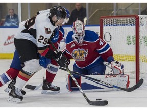 Edmonton Oil Kings goalie Travis Child watches for the shot from Hunter Campbell of the Calgary Hitmen at the Community Rink in Rogers Place in Edmonton on September 10, 2017. (File)