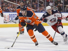 Columbus Blue Jackets forward Artemi Panarin chases Edmonton Oilers star Connor McDavid during second period NHL action in Edmonton on March 27, 2018.