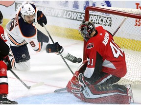 Edmonton Oilers right wing Ty Rattie (8) scores on Ottawa Senators goaltender Craig Anderson (41) during third period NHL hockey in Ottawa on Thursday, March 22, 2018.