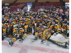 The University of Alberta Golden Bears celebrate after defeating the St. Francis Xavier University X-Men 4-2 to win the U Sports University Cup in Fredericton on Sunday, March 18, 2018.