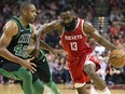 Houston Rockets guard James Harden (13) drives by Boston Celtics forward Al Horford (42) Saturday, March 3, 2018, in Houston. (AP Photo/George Bridges)