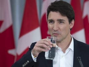 Prime Minister Justin Trudeau listens to a question as he holds a media availability at Sussex Regional High School in Sussex, N.B. on Thursday, March 22, 2018. THE CANADIAN PRESS/Andrew Vaughan