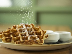 Liege Belgium waffles dusted with sugar in the new restaurant, Elbow Room, on Thursday, September 7, 2017 in Calgary, Alta. Britton Ledingham/Postmedia Network