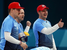 Matt Hamilton, George Tyler, John Shuster, John Landsteiner of USA celebrate after beating Canada during the PyeongChang Olympicd at Gangneung Curling Centre on February 22, 2018 in Gangneung, South Korea. (Dean Mouhtaropoulos/Getty Images)