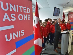 Surrounded by young soccer players, Steven Reed, President of Canada Soccer and Co-Chair of the United 2026 Bid Committee announcing that Edmonton has been named as a host city for the 2026 FIFA World Cup, that would take place in Canada, Mexico and United States, at Commonwealth Stadium in Edmonton, March 16, 2018.