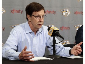 n this May 18, 2016, file photo, Nashville Predators general manager David Poile answers questions during a news conference in Nashville, Tenn. On Thursday, he moved into first place in all-time wins by an NHL GM.
