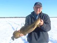 Ice angler Emmerson Dober with a nice Lake Wabamun burbot. Neil Waugh
