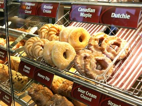 A civil war has erupted between Tim Hortons franchise holders and the parent company.