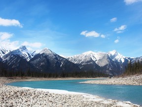 In spring the Athabasca River in Jasper runs low, clear and ice free. Neigh Waugh photo
