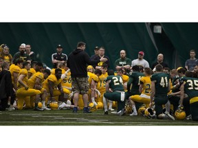 University of Alberta Golden Bears head coach Chris Morris talks to players following the Green and Gold scrimmage during spring football camp in the Foote Field dome on Sunday, April 29, 2018 in Edmonton. (Greg Southam)