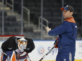 Edmonton Oilers assistant coach Jay Woodcroft directs a drill during an Edmonton Oilers practice at Rogers Place in Edmonton, Alberta on Nov. 14, 2016.