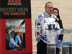 Ron Lowe, shown here speaking about Hockey Helps the Homeless at city hall in 2013, will be behind the bench at this year's event.