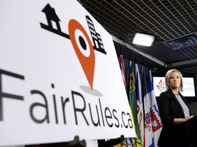 Susie Grynol, president of the Hotel Association of Canada, speaks at a press conference calling on the federal government to take action on tax avoidance by digital platforms such as Airbnb, on Parliament Hill in Ottawa on Monday, April 30, 2018.