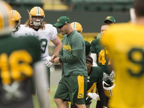 Head coach Jason Maas watches one-on-ones during Edmonton Eskimos training camp at Commonwealth Stadium in Edmonton on June 4, 2017.