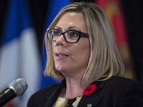 Manitoba Environment Minister Rochelle Squires responds to a question during a news conference after a Canadian Council of Ministers of the Environment meeting in Vancouver on Friday, November 3, 2017.