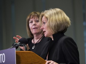 Premier Rachel Notley talks about new legislation giving Alberta the power to control the oil and gas resources that belong to all Albertans as Energy Minister Margaret McCuaig-Boyd listens on Monday, April 16, 2018 in Edmonton.