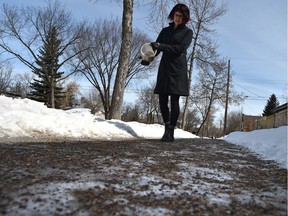 Nicola Feilden is one of many Westmount residents who have noticed the city's brand new sidewalks seem to have trouble draining and here this one spot where the water returns, again and again. And now she's got a warning letter from the city for it in Edmonton, April 6, 2018.