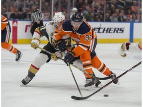 Edmonton Oilers captain Connor McDavid skates past William Karlsson of the Vegas Golden Knights at Rogers Place in Edmonton on Thursday, April 5, 2018. (Shaughn Butts)