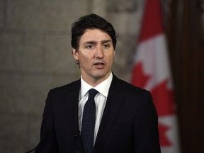 Prime Minister Justin Trudeau makes a statement on the incident involving pedestrians being struck by a van in Toronto, in the Foyer of the House of Commons on Parliament Hill on Tuesday, April 24, 2018 in Ottawa. THE CANADIAN PRESS/Justin Tang