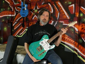 Todd Crawshaw, executive director of The Rock and Roll Society of Edmonton, at a warehouse where a collection of five autographed guitars were stolen early Sunday.