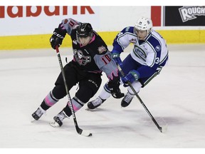 Swift Current Broncos forward Matteo Gennaro, seen here pacing Calgary Hitmen left winger Jakob Stukel in this file photo from Dec. 8, 2017, has been a factor since being traded from Calgary to Swift Current earlier this season. (File)