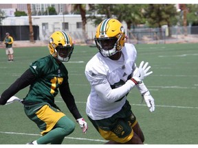 New Edmonton Eskimos receiver Torrance Gibson, right, practices with the club for the first time as a three-day mini-camp opened at at the University of Nevada – Las Vegas Bill 'Wildcat' Morris Rebel Park in Las Vegas on Sunday, April 22, 2018.