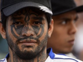 Members of Mara Salvatrucha (MS-13), held on March 4, 2013, in the Criminal Center of Ciudad Barrios, San Miguel, in El Salvador. (AFP/GETTY IMAGES)