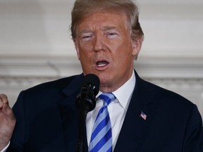 President Donald Trump delivers a statement on the Iran nuclear deal from the Diplomatic Reception Room of the White House on May 8, 2018. (AP Photo)