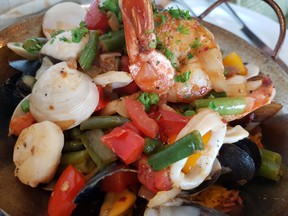 The paella at Bodega 124th Street is packed with the freshest of seafood.