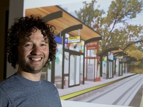 Artist Adad Hannah poses with a rendering of the piece he has been selected to create for the new Holyrood LRT stop, in Edmonton Saturday May 19, 2018. Photo by David Bloom